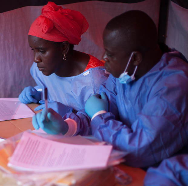 Ebola vaccines trials in Guinea   Nene Aminata Diallo (left) and Gamou Saiman Gaston (right), carefully go through the consent process with a participant in the Ebola vaccine trial  Getting clear consent from participants, that this is a trial, that there are no guarantees, that there may be unexpected consequences from the vaccine, are a core part of the trial process    The World Health Organisation is running phase III clinical trials for Ebola virus disease vaccine in Guinea  The technique being used is  ring vaccination  which was used in the 1970s to eradicate smallpox 